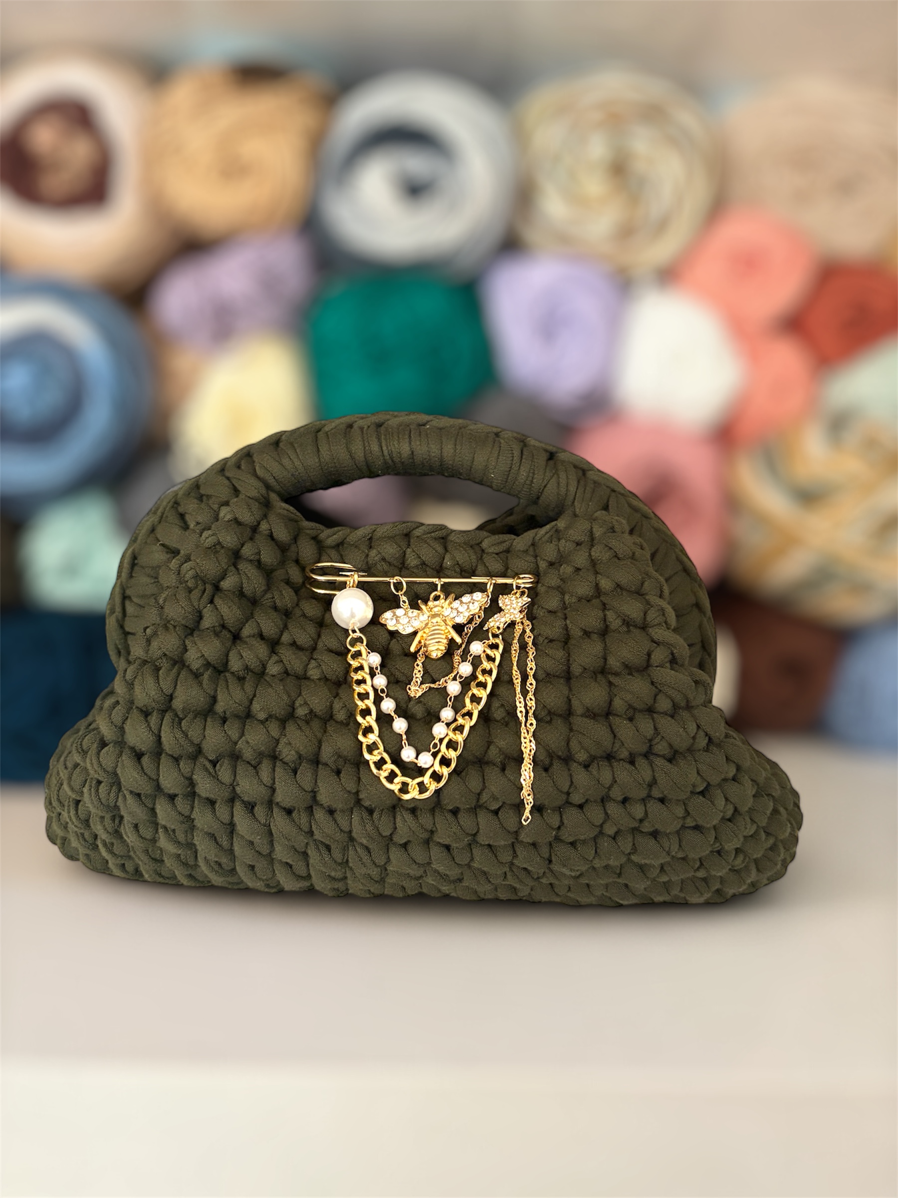 Livvy clutch (green) — handmade crochet bags in the UAE